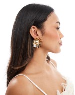 statement sunflower earrings in gold