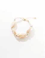 bracelet with faux shell and gold bead design