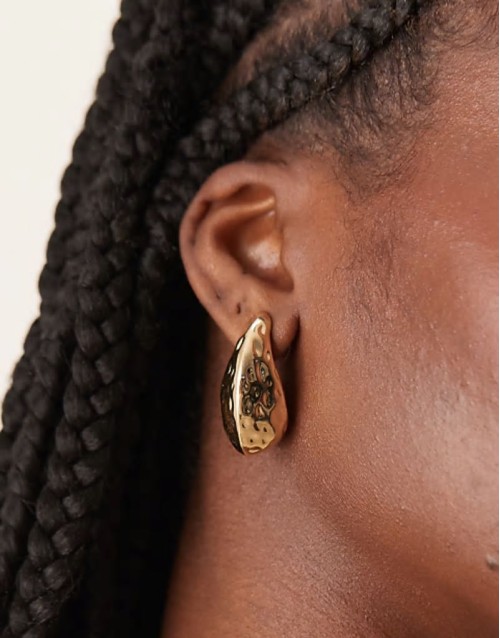 earrings in textured molten design in gold tone
