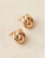 earrings in knot design in gold tone