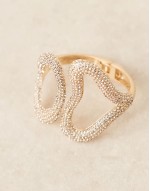 cuff bracelet with abstract crystal detail in gold tone
