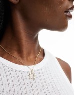 celestial sun necklace in gold