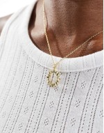 celestial sun necklace in gold