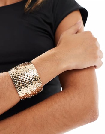 cuff bracelet with textured weave design in gold tone