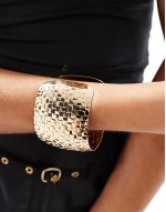 cuff bracelet with textured weave design in gold tone